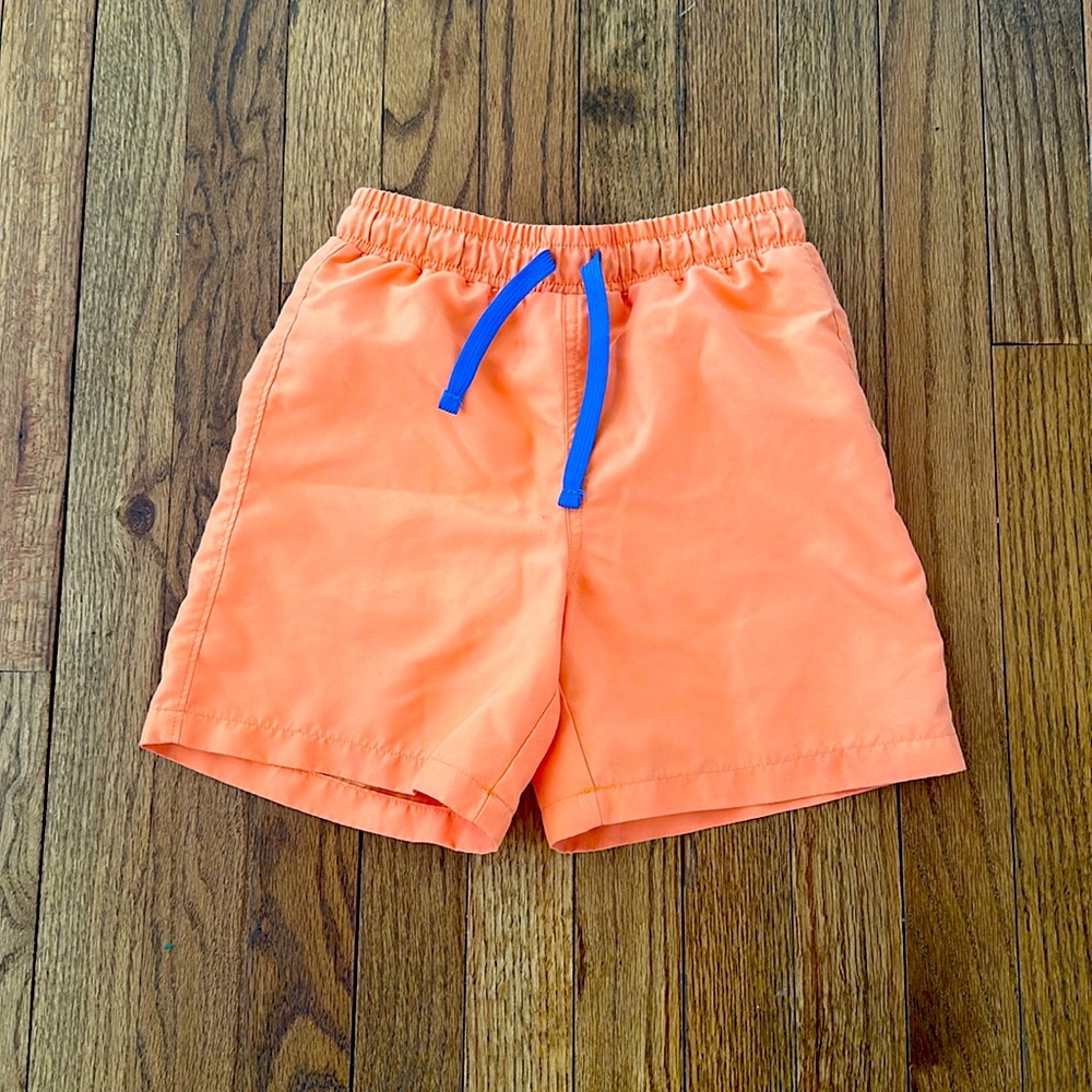 Primary neon orange swing trunks - size 6-7.